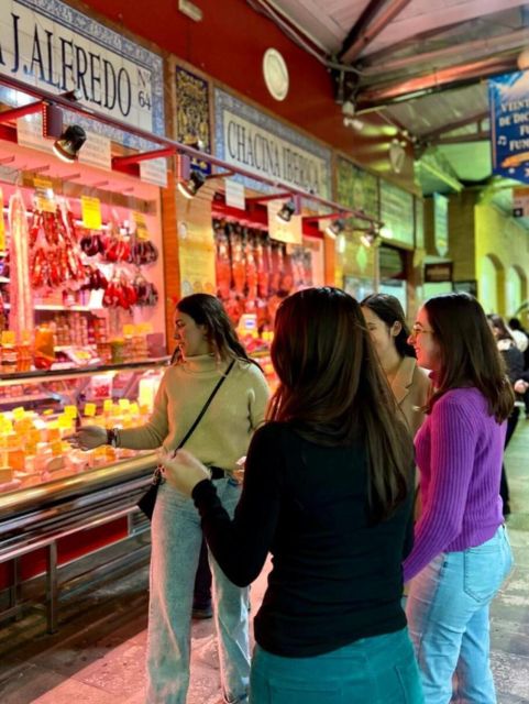 Triana Market Tapas Tour - Sampling Iberian Ham, Cured Meats, and Spicy Olives