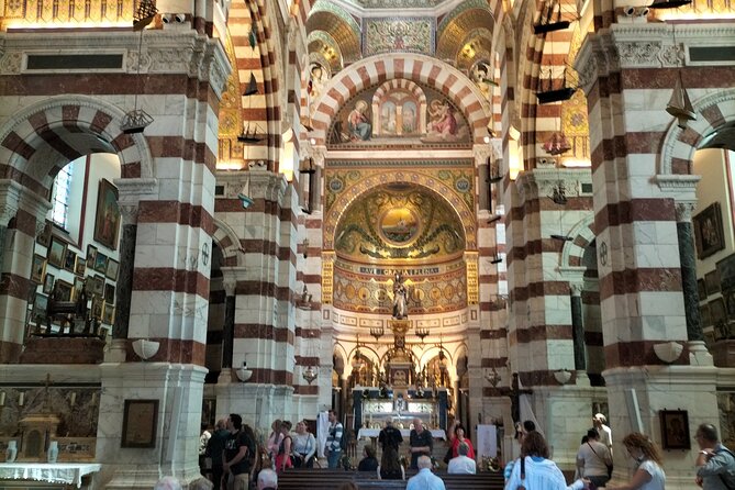 Trip to Aix-en Provence, Marseille & Countryside Wine Tour - Pétanque and Provencal Snacks in a Hilltop Village