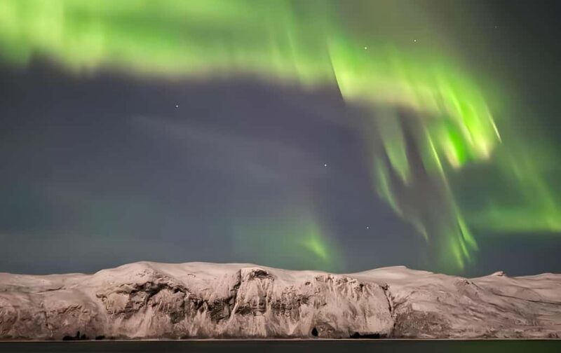 Tromsø: Northern Lights Bus Tour with Free Photography - The Science and Stories Behind the Aurora Borealis