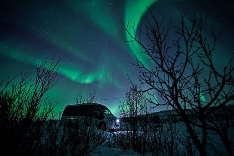 Tromsø: Northern Lights by Minibus with Photos & bodysuits - Thermal Suits, Food, and Other Amenities