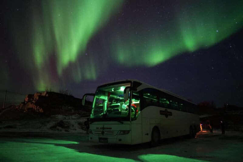 Tromsø: Northern Lights Tour with Local Stories & Photos - Key Points