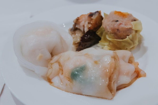 Under the Surface of Montreal's Chinatown: Guided Food Walking Tour - Starting Point at Place d’Armes with a Brief Montreal History