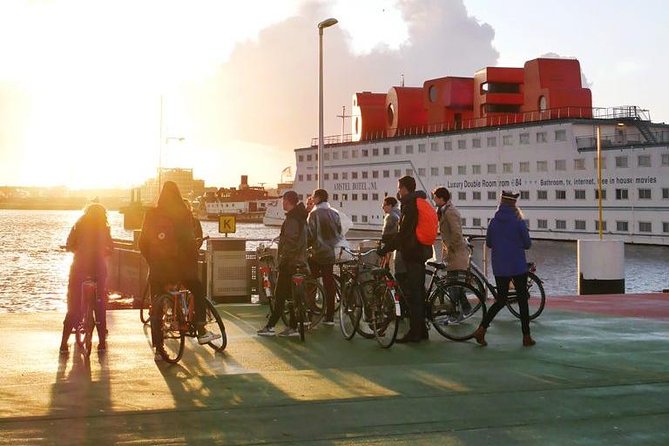 Urban Adventures Amsterdam Bike Tour, Graffiti and Magnet Fishing - Crossing to Amsterdam Noord by Ferry and Modern Architecture