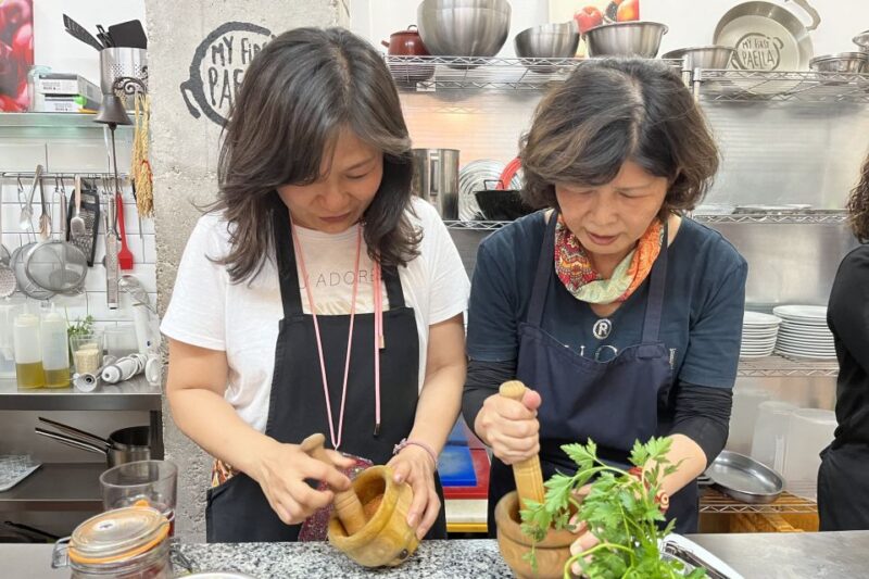 Valencia: Evening Guided Paella Workshop, Tapas, and Drinks - Savoring the Meal with Iconic Tapas and Desserts