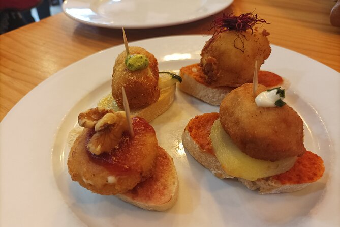 Valencia Food Tour: Tapas, Drinks and Delights with a Local - Visiting Top Specialty Shops and Eateries in Valencia