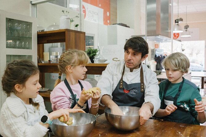 Valencian paella workshop and visit to the Algiros market - Making Valencian Paella with Expert Chefs