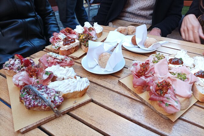 Venice Bacaro Food Tour - Eat and Drink like a Venetian - Sampling at a Famous Venetian Rosticceria on Calle de la Bissa
