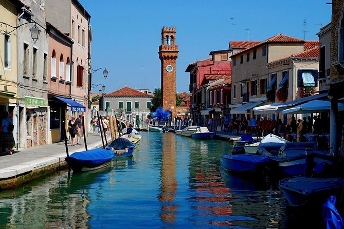 Venice: Boat Tour to Murano, Burano and Torcello with Fish Lunch - The Boat and Guide Experience