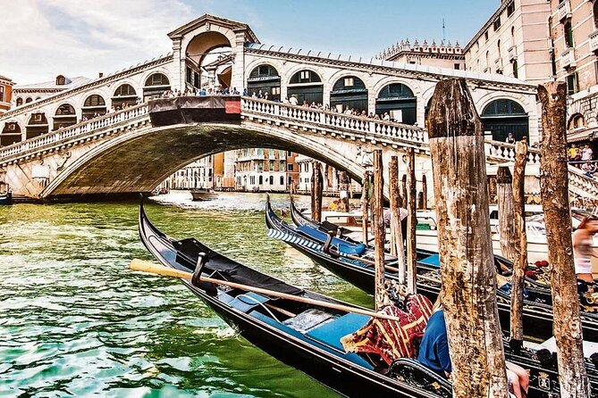 Venice: Enchanting City Walk & Majestic Gondola Glide! - Crossing the Rialto Bridge and Viewing the Grand Canal