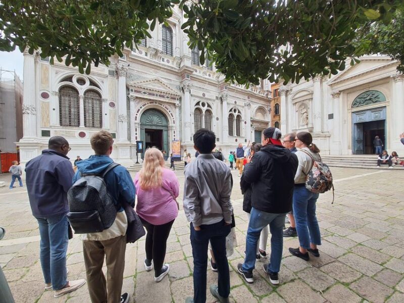 Venice: Walking Guided Tour of the City Must-See Sites - Discovering the Scuola Grande di San Rocco and Its Artistic Treasures