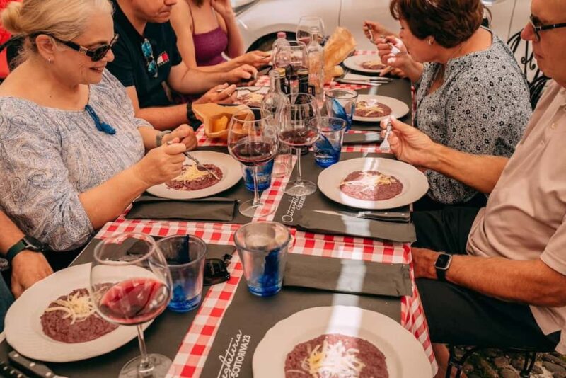Verona: Guided Food Walking Tour with Amarone Wine tasting - Exploring Piazza delle Erbe with Local Snacks