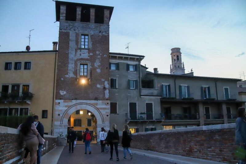Verona: street food walking tour near the historical center - Crossing the Roman Bridge: Ponte Pietra