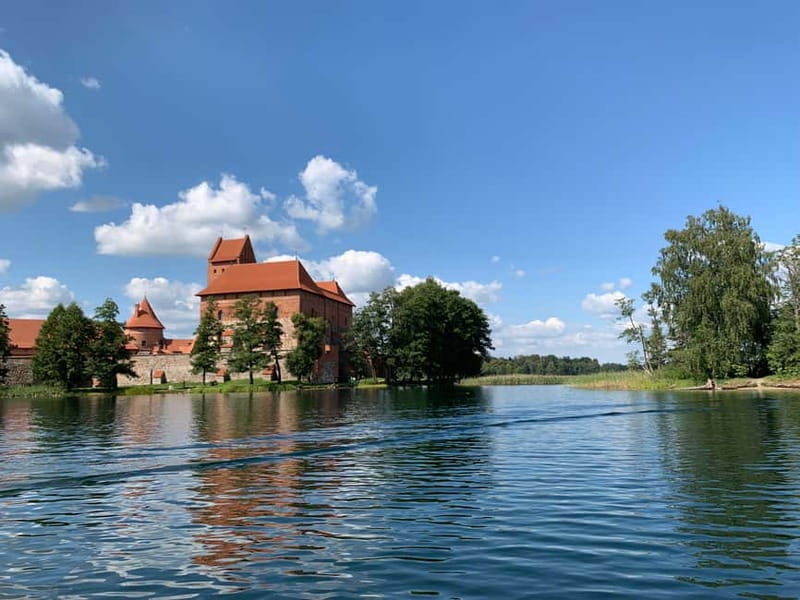 Vilnius: Private Paneriai Park, Trakai Castle, Kernav Tour - Discovering Trakai Castle on Its Water-Linked Island