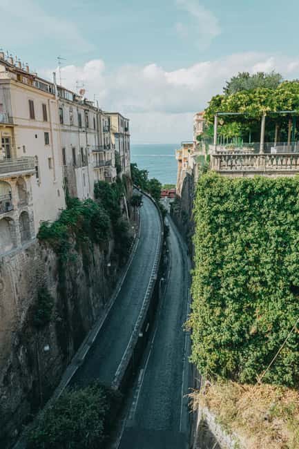 Visit Amalfi, take a guided tour of the Paper Museum, and enjoy the Handmade Paper Experience - Scenic Coastal Views and Photo Stops Along the Route