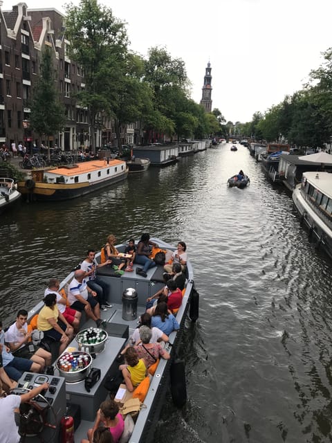 Visit Amsterdam by Boat with a French Guide (french) - The Unique Itinerary and Canal Stops