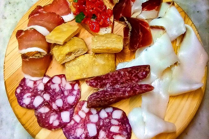 Visit to the Cinta Senese farm in Montepulciano - Walking Through the Olive Grove and Vineyard