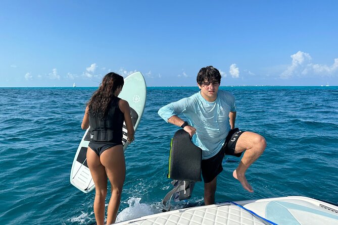 Wake Surfing Lessons & Snorkeling - #1 Experience in Cancun 4hr - Relaxing on the Boat and Enjoying Refreshments