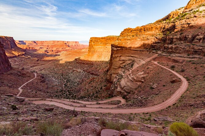 Walk With The Ancients Secluded Sunset Canyonlands Hike Adventure - Guided Sunset Tours of Arches in a Comfortable Vehicle