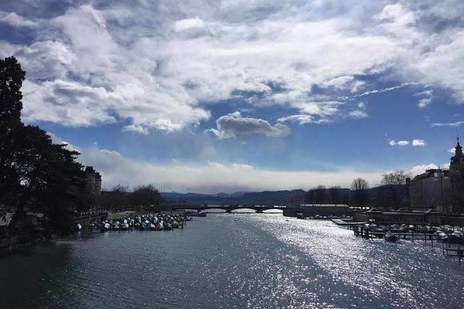 Walking tour of Zurich - your first overview of the city (Private Tour) - Passing the Limmat River for Scenic Views