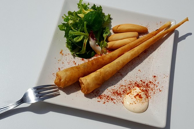 Wine & Tapas tour by electric bike (e-bike) including Ronda pickup (full day) - Guided Walks and Scenic Stops at Villages