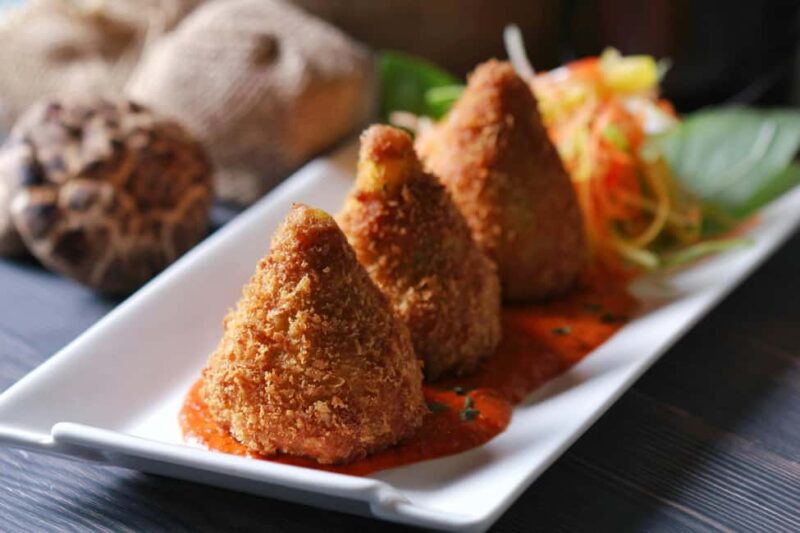 Wine tasting and arancini in a restaurant in Piazza Armerina - Key Points