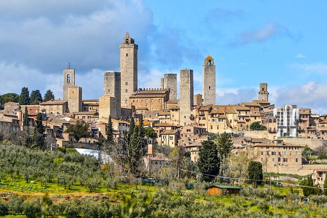 Wine Tasting & Tuscany Countryside, San Gimignano & Volterra - Wine Tasting at a Local Farmhouse: Flavors and Snacks
