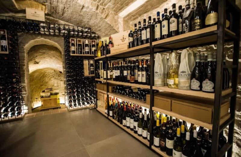 Wine Tasting with Food in a Stone Cellar in Montepulciano - Key Points