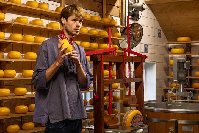 Zaanse Schans Windmills and Volendam from Amsterdam, Live Guided - Optional Amsterdam Canal Cruise: Scenic City Views