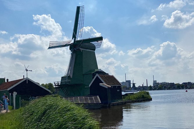 Zaanse Schans Windmills & Zaandam: Countryside Electric Bike Tour - Re-entering Amsterdam via NDSM Wharf and Central Station