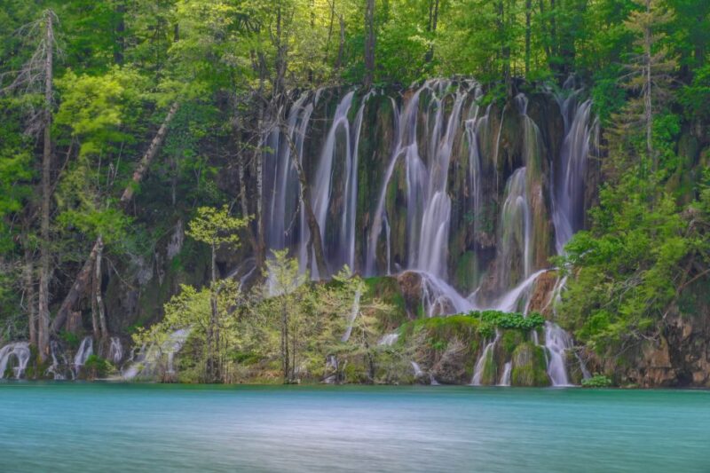 Zadar: Plitvice Lakes Guided Day Tour with Tickets - Inside the Park: Pathways, Caves, and Waterfalls