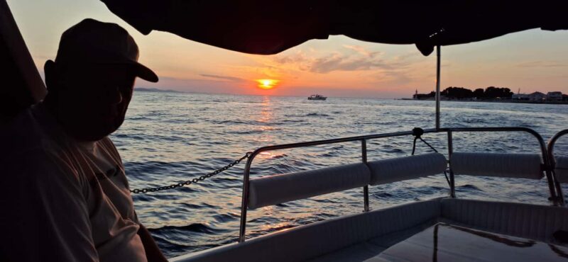 Zadar: Sunset Cruise by Vintage Boat with Wine and Snacks - Included Amenities and Onboard Comforts