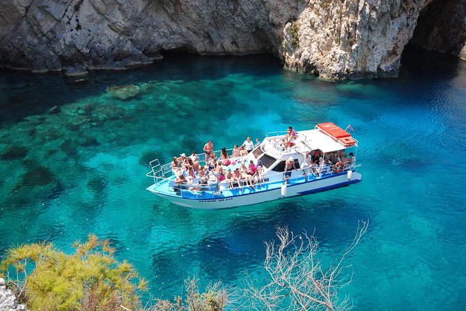 Zakynthos boat tour:Shipwreck& Local blue caves with 3 Swim Stops - Key Points