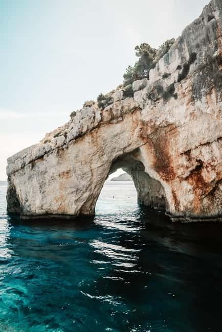Zakynthos: Shipwreck, Blue Caves and Highlights Tour - Relaxing at Xigia Beach’s Natural Spa Waters