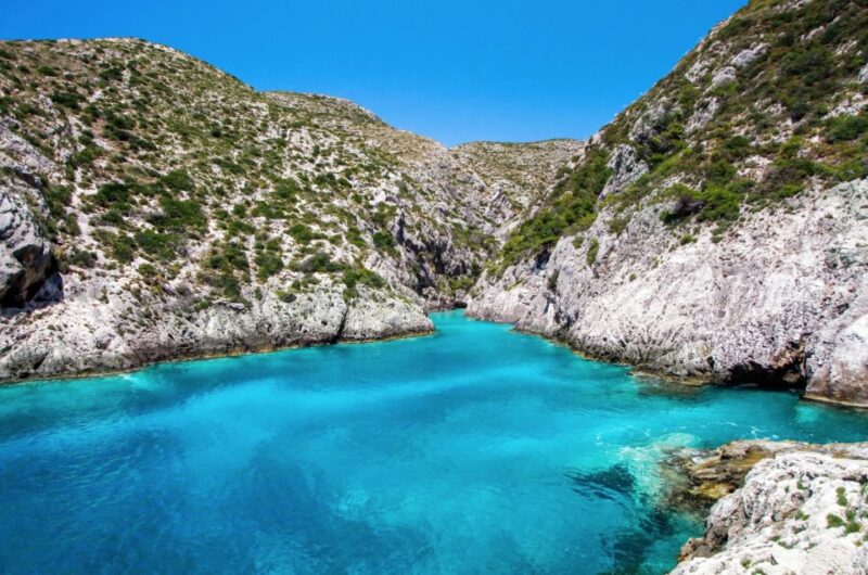 Zakynthos: West Coast & Navagio Bay Cruise with 2 Swim Stops - White Beach and Sfogio Beach: Pristine Waterfronts