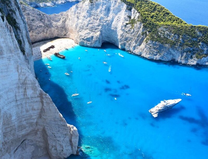 Zante Cruise to Blue Caves & Shipwreck Beach Photostop - Exploring Agios Nikolaos Village and Tasting Local Cuisine
