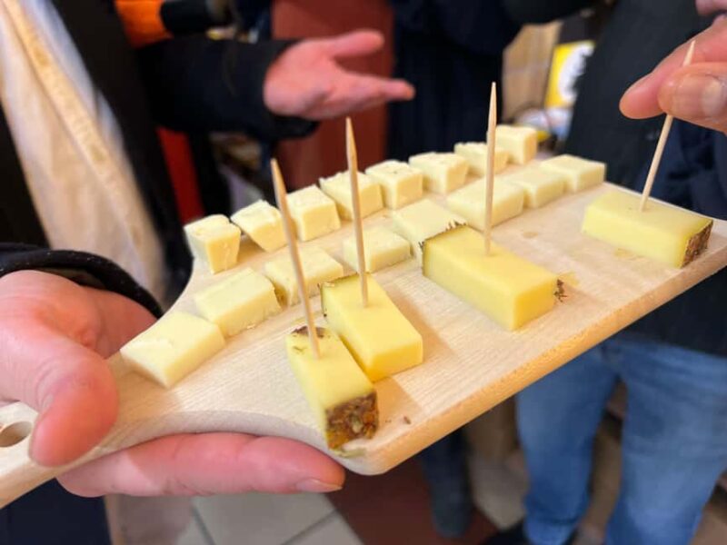 Zurich: Food Tour of 8+ Tastings with Cheeses & Chocolates - Artisanal Cheese Tasting with Hay Schnaps and Cheese Tart