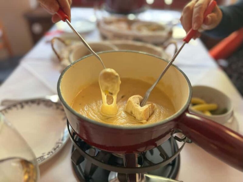Zurich: Food Tour of 8+ Tastings with Cheeses & Chocolates - Fondue Bites Dipped in Kirsch Liqueur