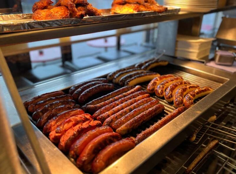 Zurich: Food Tour of 8+ Tastings with Cheeses & Chocolates - Tasting Historic Gin at a Local Bottle Shop