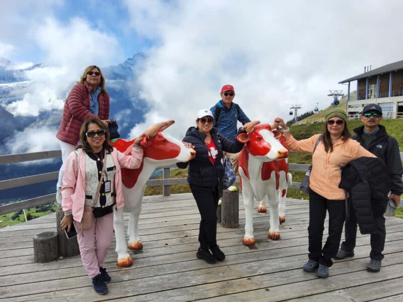 Zürich: Jungfrau Region Day Trip with Train and Hidden Gem - Viewing the Iconic Waterfalls and Cliffs