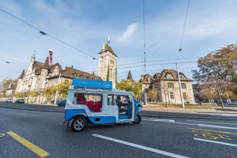 Zurich: Private eTukTuk City Tour - Driving Past Bahnhofstrasse and Paradeplatz